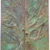 Striking double doors with repoussé of a large tree, by Archive Designs